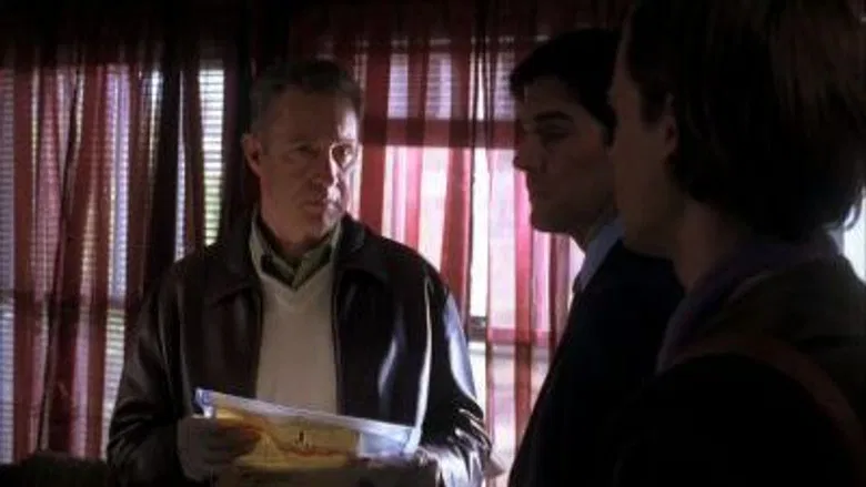 Cena do episódio 15: Negócios Inacabados